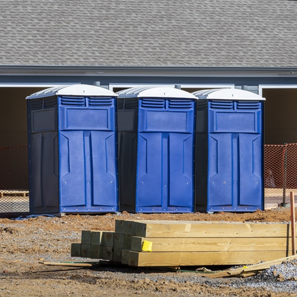 what is the cost difference between standard and deluxe porta potty rentals in Binger OK